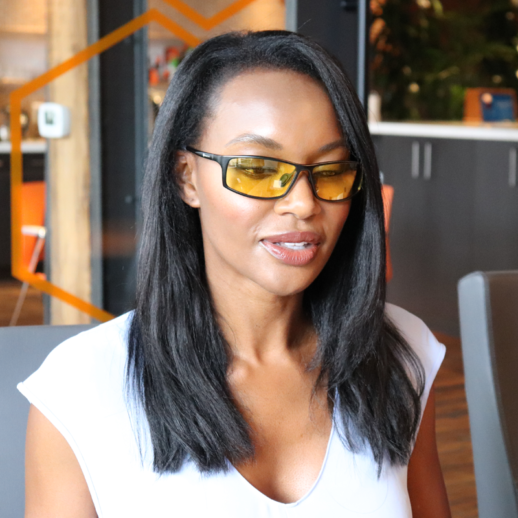 Woman wearing TrueDark Daylight Elite Glasses