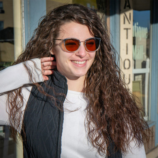 Woman wearing TrueDark Daylights Malibu Transitional Sunglasses Transitioned to Amber
