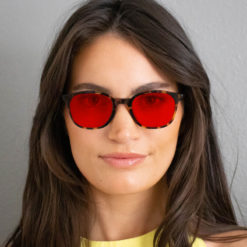 Woman wearing TrueDark® Twilights Dark Tortoiseshell Pro glasses