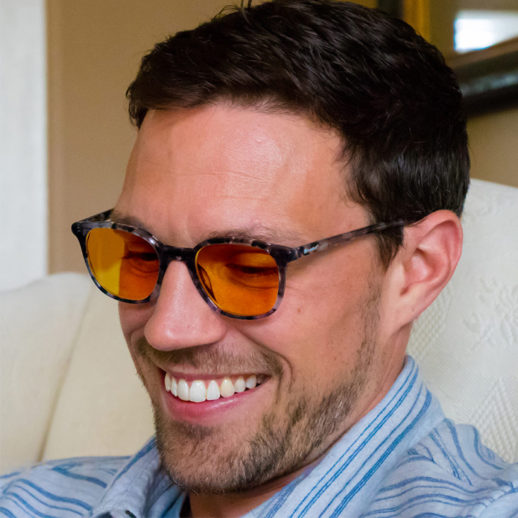 Man wearing TrueDark® Daylights Amber Grey Tortoiseshell Pro glasses