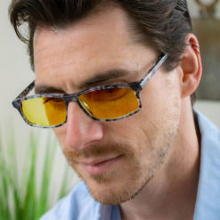 Man wearing TrueDark® Daylights Amber Grey Tortoiseshell Vista Glasses